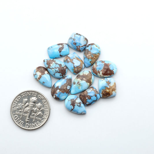 Discover the beauty of Natural Golden Hills Turquoise—prized for its icy blue tones, golden matrix, and exceptional quality. Ideal for artisan jewelry designs.