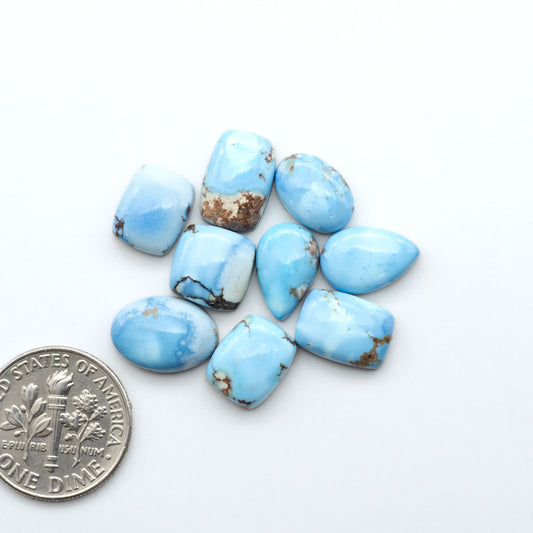 Discover the beauty of Natural Golden Hills Turquoise—prized for its icy blue tones, golden matrix, and exceptional quality. Ideal for artisan jewelry designs.