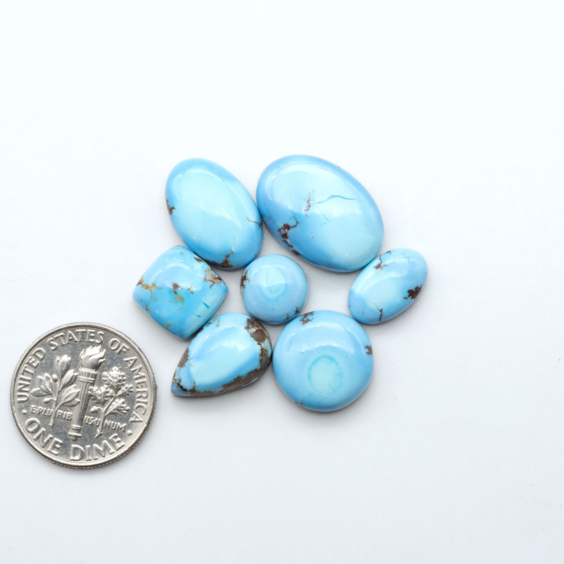 Discover the beauty of Natural Golden Hills Turquoise—prized for its icy blue tones, golden matrix, and exceptional quality. Ideal for artisan jewelry designs.