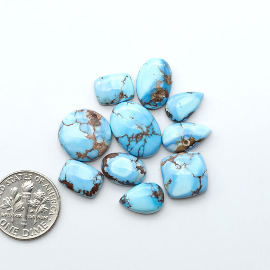 Discover the beauty of Natural Golden Hills Turquoise—prized for its icy blue tones, golden matrix, and exceptional quality. Ideal for artisan jewelry designs.