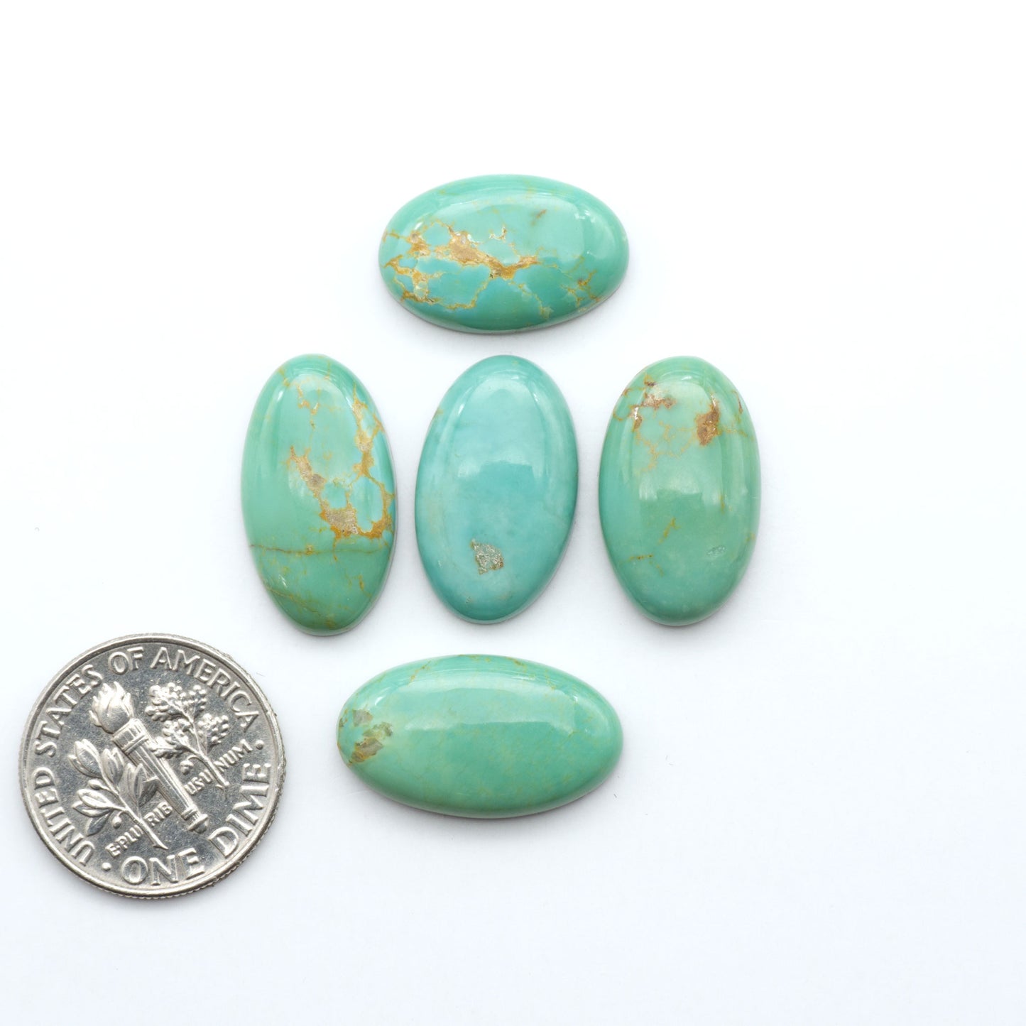 Experience the beauty of Turquoise Mountain Cabochons. With their distinctive blue and green color, these gemstones are perfect for any jewelry piece.