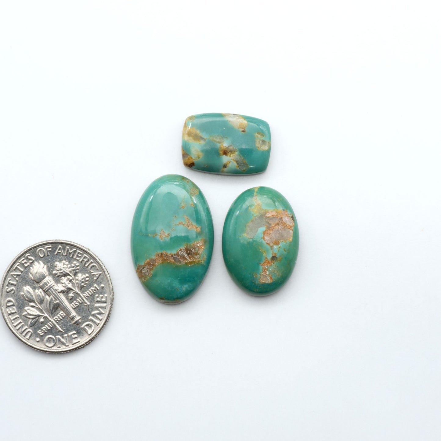Experience the beauty of Turquoise Mountain Cabochons. With their distinctive blue and green color, these gemstones are perfect for any jewelry piece.