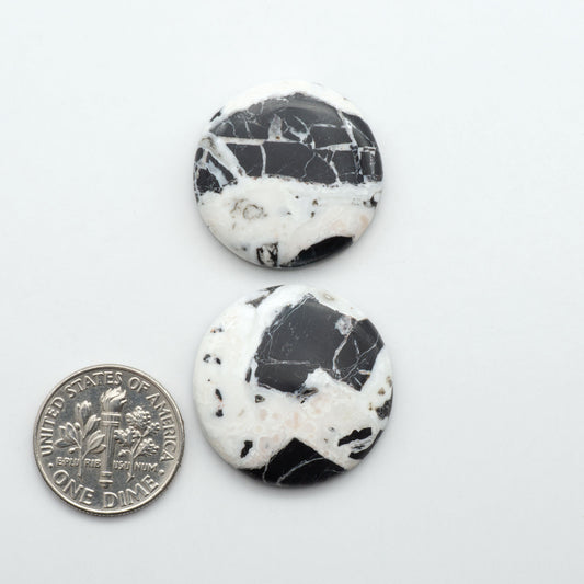 Natural White Buffalo Stone Cabochons are semi-precious gemstones cut into shapes ideal for jewelry-making, making them an excellent choice for artisans.