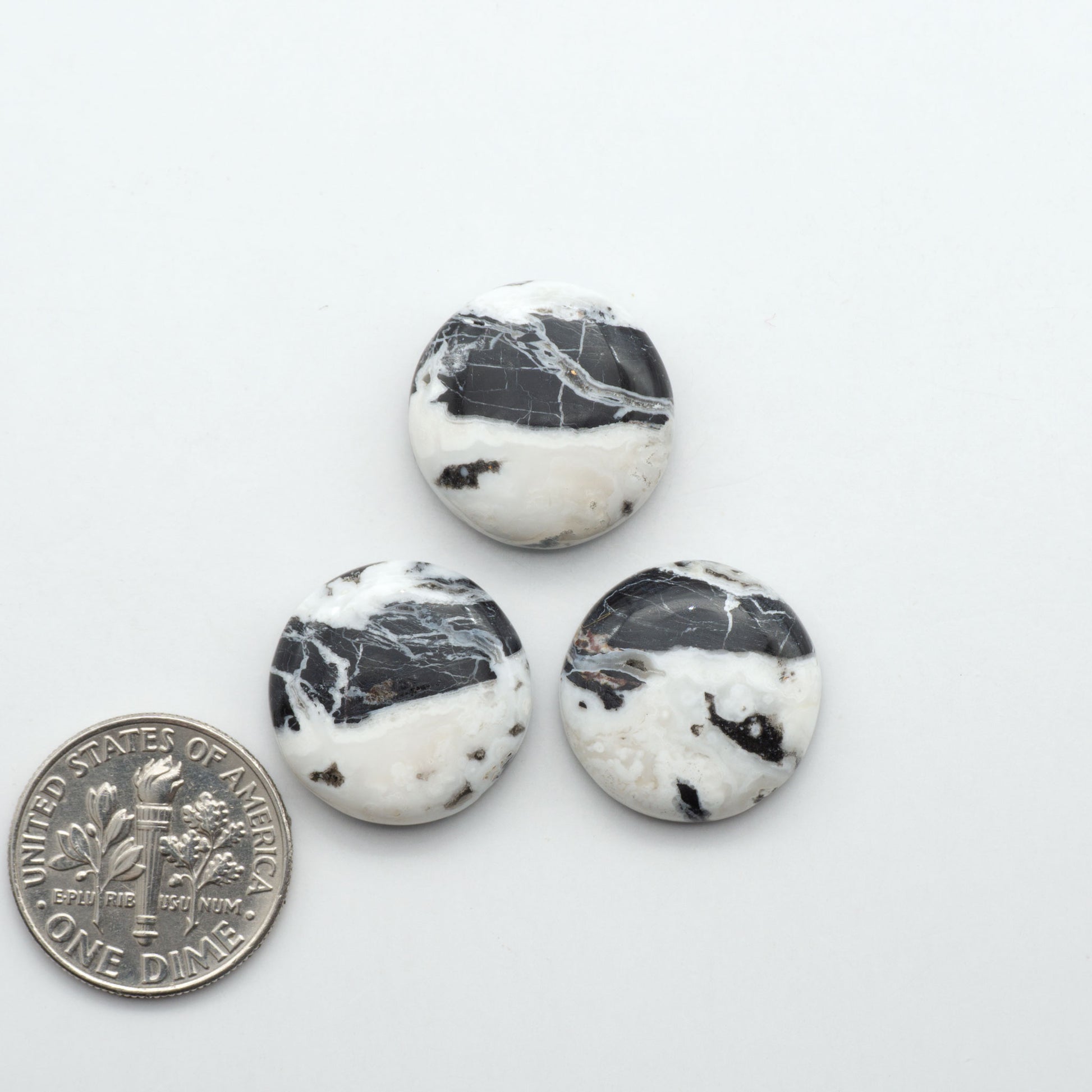 Natural White Buffalo Stone Cabochons are semi-precious gemstones cut into shapes ideal for jewelry-making, making them an excellent choice for artisans.
