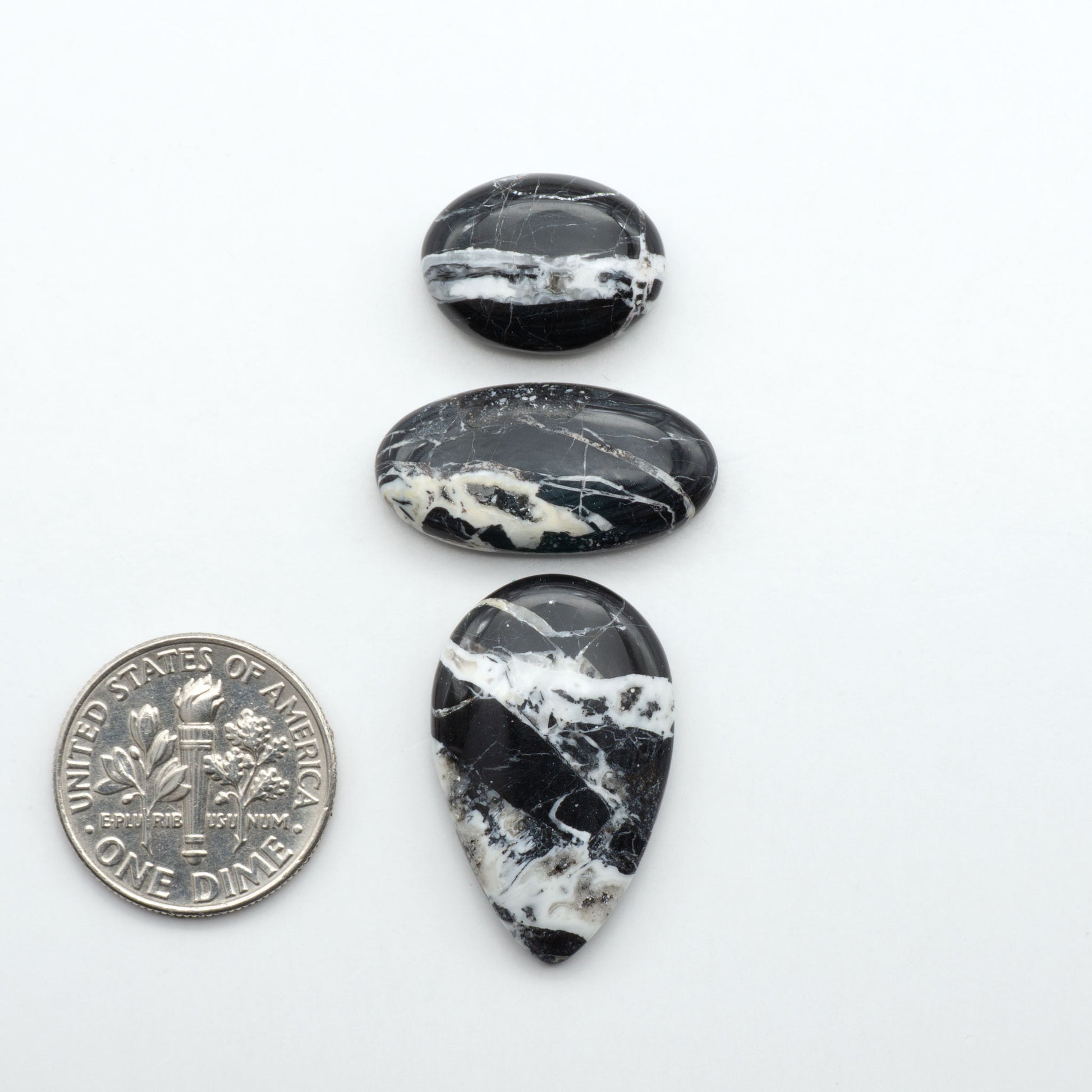 Natural White Buffalo Stone Cabochons are semi-precious gemstones cut into shapes ideal for jewelry-making, making them an excellent choice for artisans.
