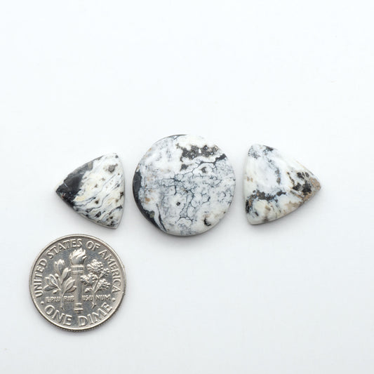 Natural White Buffalo Stone Cabochons are semi-precious gemstones cut into shapes ideal for jewelry-making, making them an excellent choice for artisans.