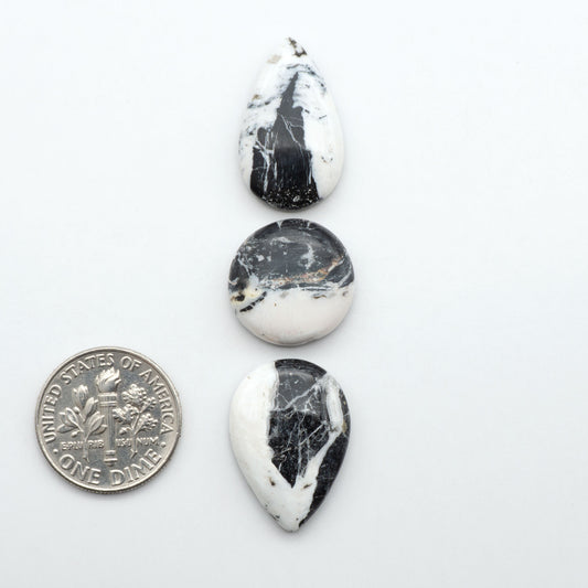 Natural White Buffalo Stone Cabochons are semi-precious gemstones cut into shapes ideal for jewelry-making, making them an excellent choice for artisans.