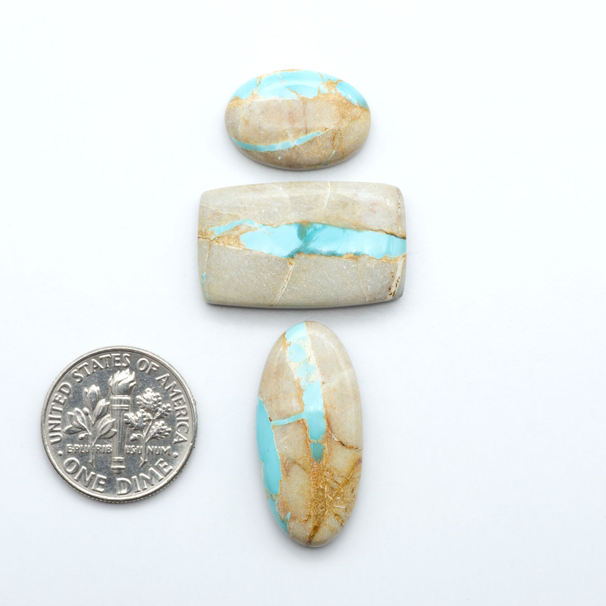 Royston Turquoise cabochons are famous for their distinctive matrix and unique green and blue hues, making them a favored option among jewelry designers.