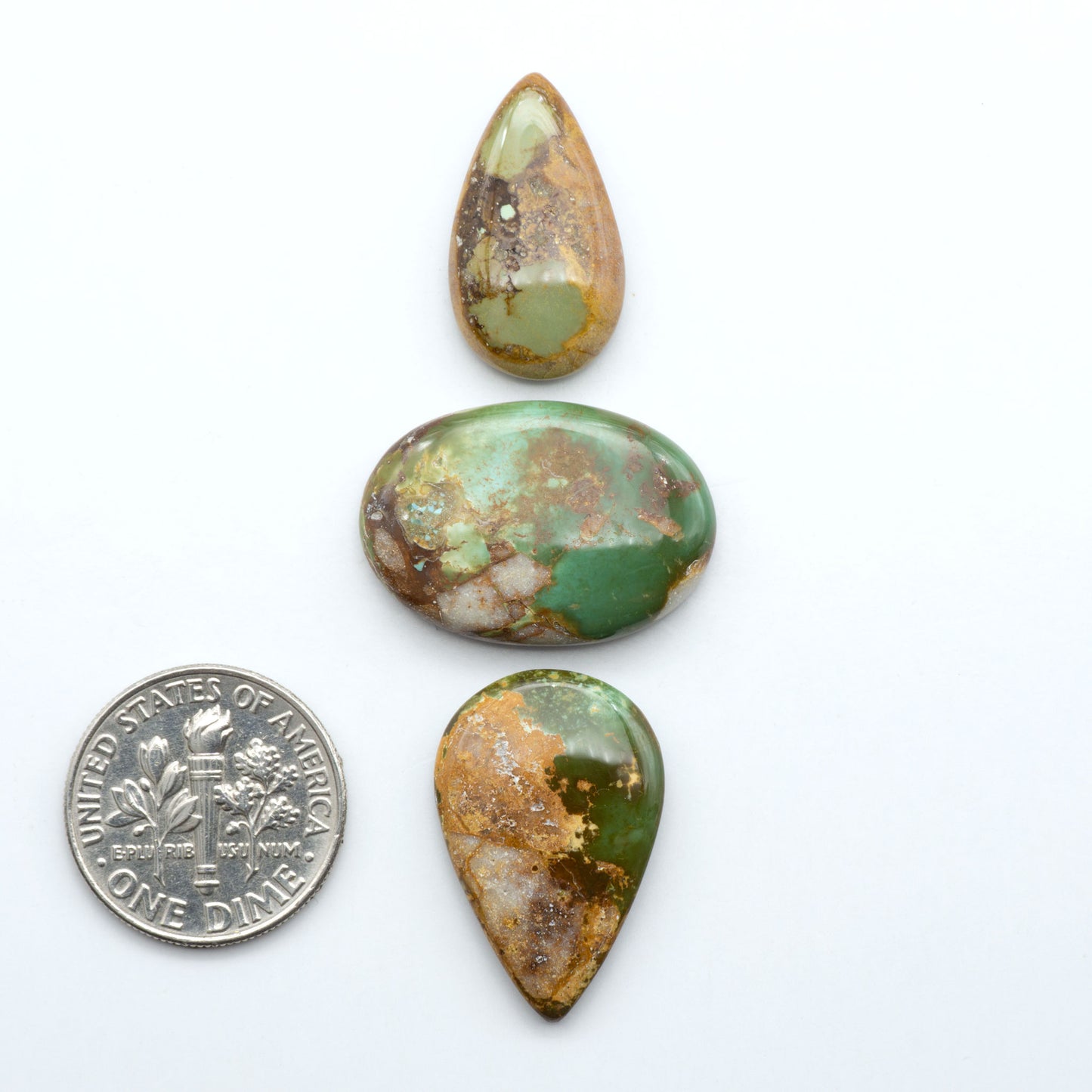 Royston Turquoise cabochons are famous for their distinctive matrix and unique green and blue hues, making them a favored option among jewelry designers.