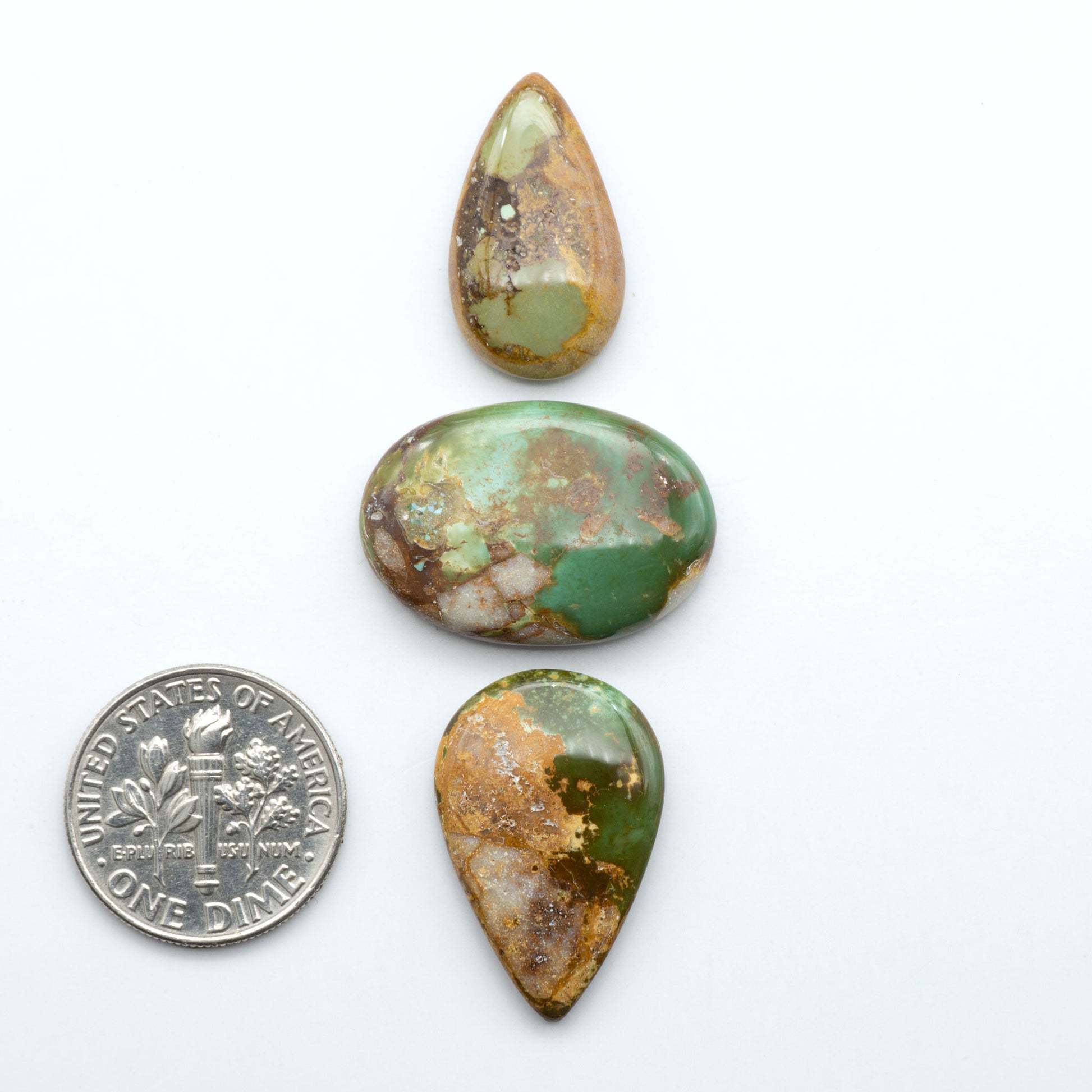 Royston Turquoise cabochons are famous for their distinctive matrix and unique green and blue hues, making them a favored option among jewelry designers.