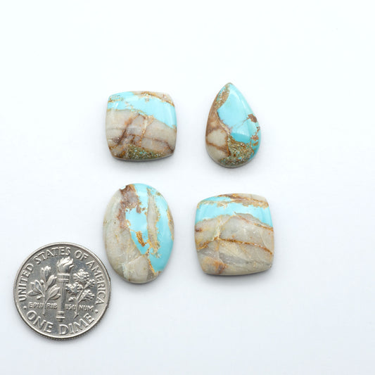 Royston Turquoise cabochons are famous for their distinctive matrix and unique green and blue hues, making them a favored option among jewelry designers.