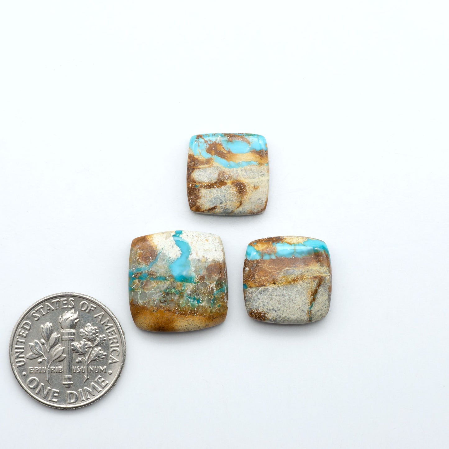 Royston Turquoise cabochons are famous for their distinctive matrix and unique green and blue hues, making them a favored option among jewelry designers.