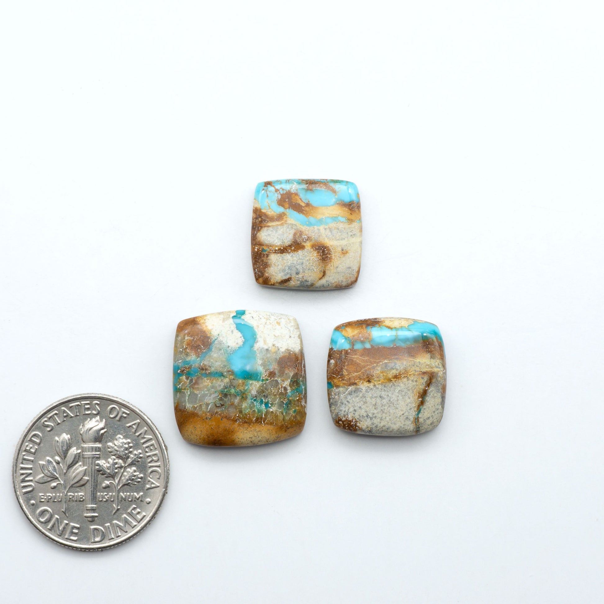 Royston Turquoise cabochons are famous for their distinctive matrix and unique green and blue hues, making them a favored option among jewelry designers.