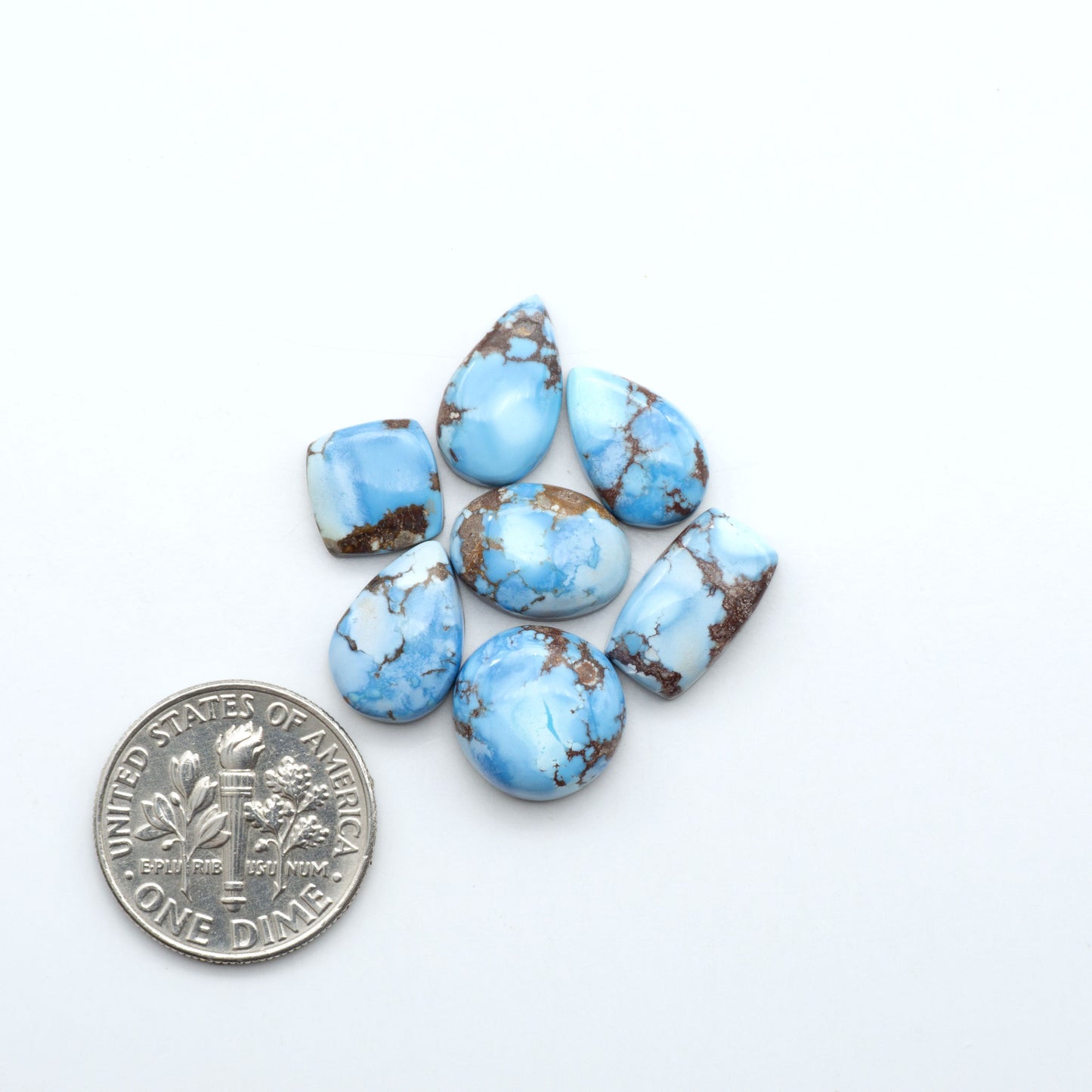 Discover the beauty of Natural Golden Hills Turquoise—prized for its icy blue tones, golden matrix, and exceptional quality. Ideal for artisan jewelry designs.