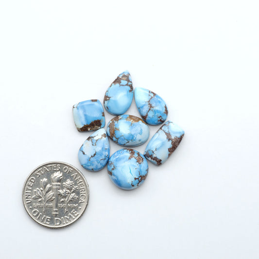 Discover the beauty of Natural Golden Hills Turquoise—prized for its icy blue tones, golden matrix, and exceptional quality. Ideal for artisan jewelry designs.