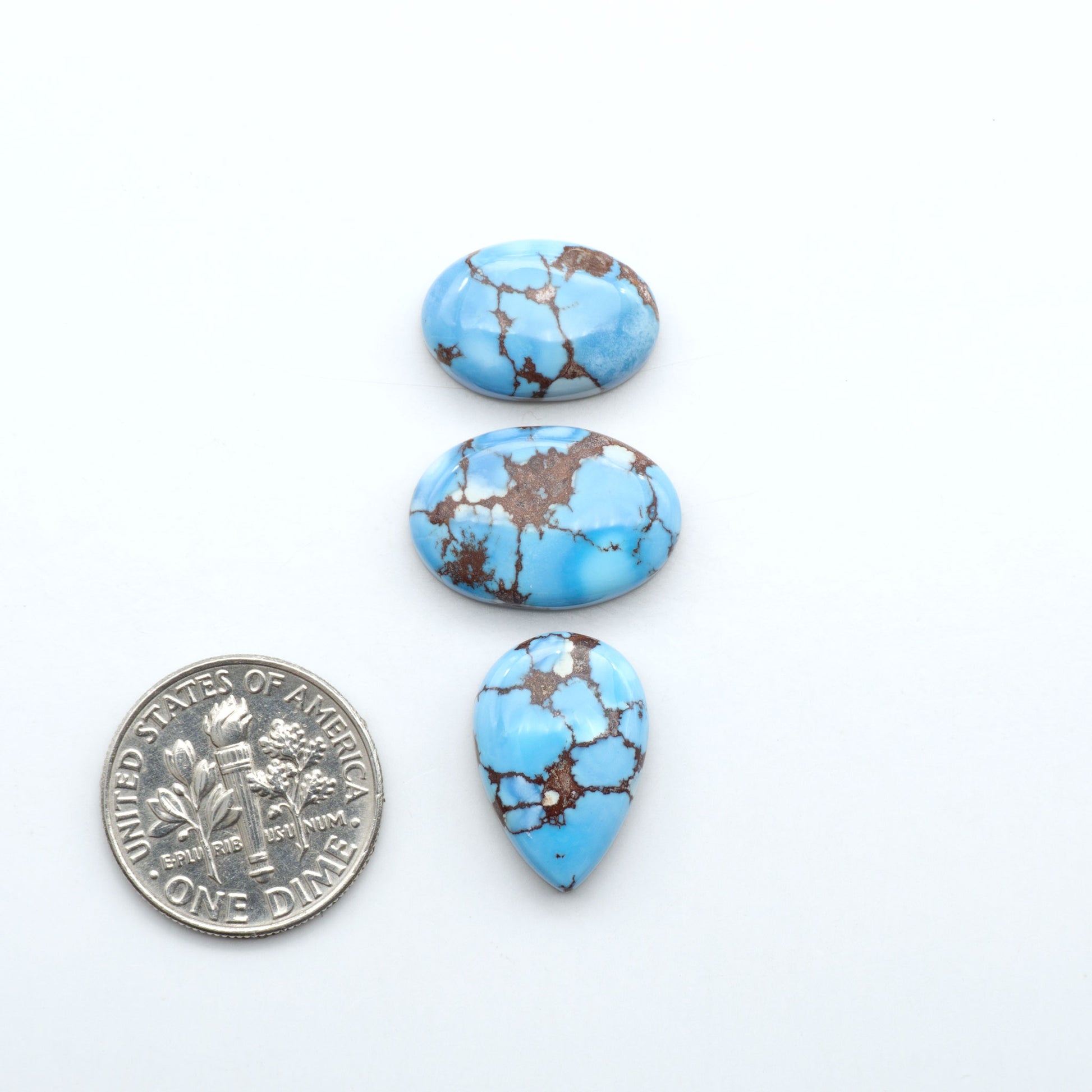 Discover the beauty of Natural Golden Hills Turquoise—prized for its icy blue tones, golden matrix, and exceptional quality. Ideal for artisan jewelry designs.