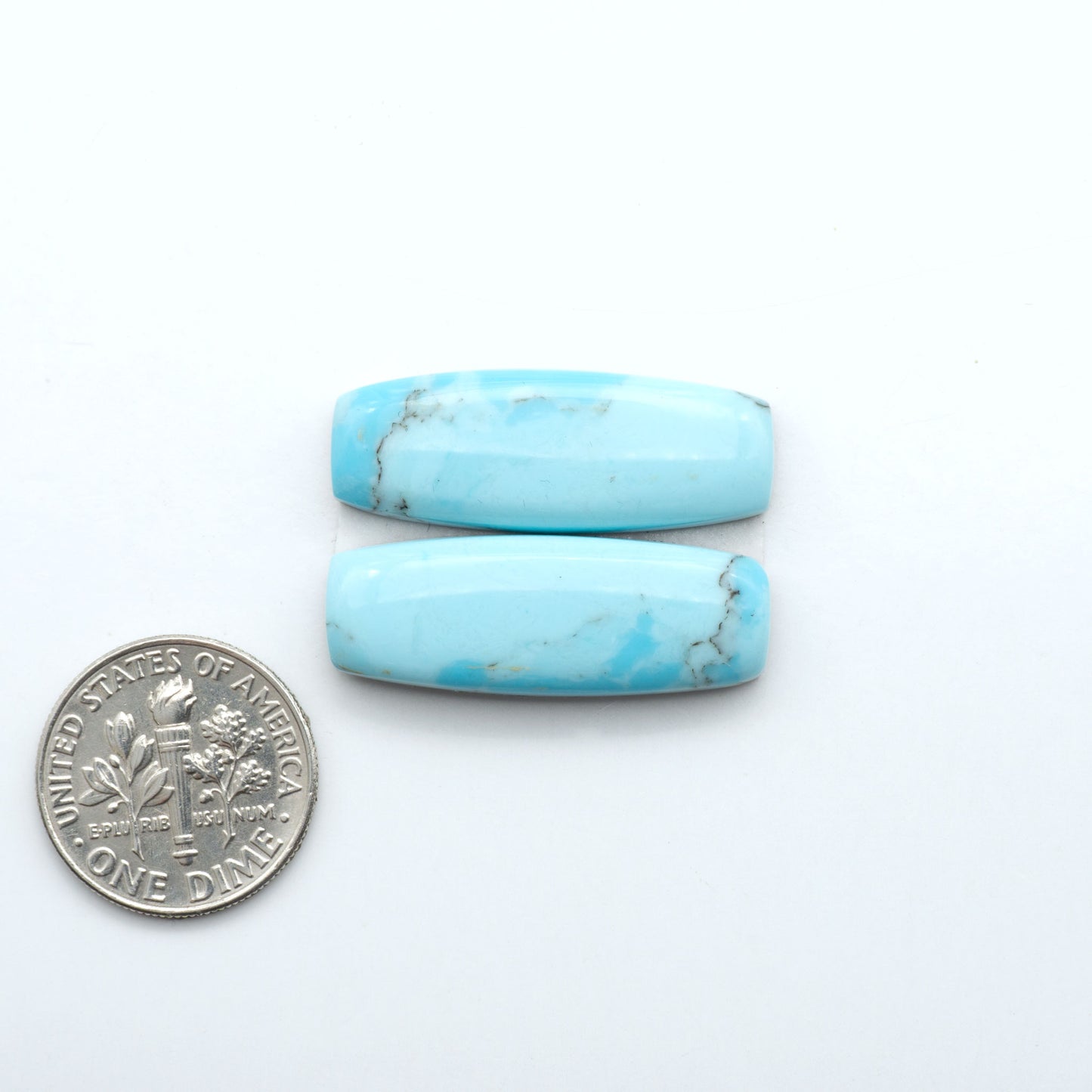 Pressed Turquoise Nugget cabochons made from stabilized composite material and backed for strength. Rich color and matrix for jewelers and artisans.
