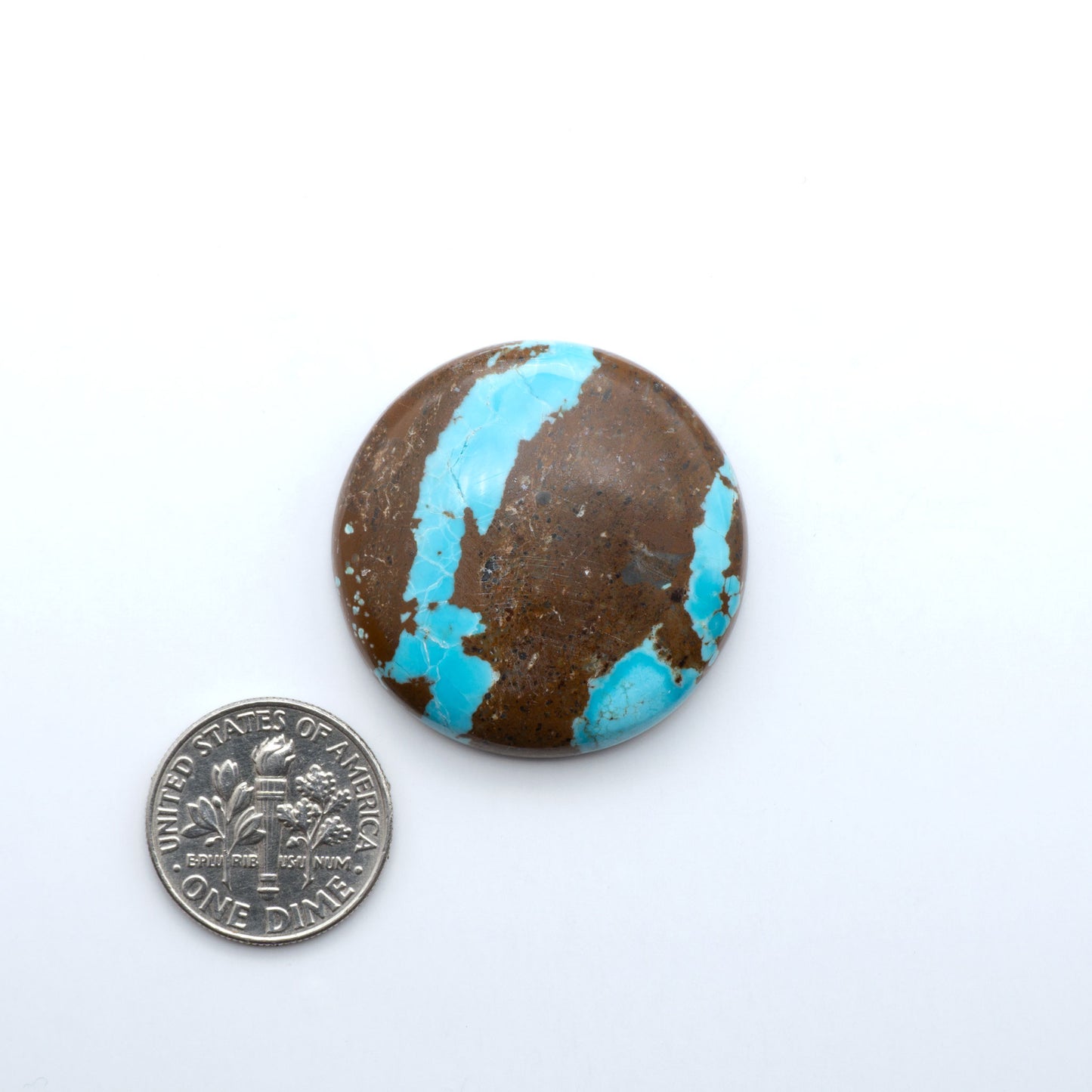 Number 8 Turquoise cabochons, blue and green color with brown matrix, polished stones on a white background, with a US dime for scale