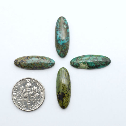 Hubei Cloud Mountain Turquoise cabochons, blue and green color with black matrix, polished stones on a white background with a US dime for scale